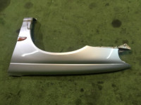 Guarda-lamas dianteiro esquerdo SUBARU LEGACY OEM 57110AC110 BG5 1998 Silver 406