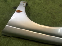 Guarda-lamas dianteiro esquerdo SUBARU LEGACY OEM 57110AC110 BG5 1998 Silver 406