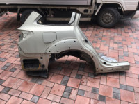 Guarda-lamas traseiro direito 51439AJ0209P SUBARU OUTBACK