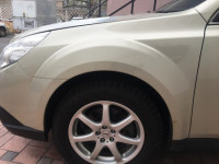 Guarda-lamas dianteiro esquerdo 57120AJ0509P SUBARU OUTBACK