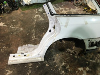 Guarda-lamas traseiro esquerdo SUBARU LEGACY OEM 51410AE150 BH5 1998 Whait 51E