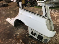 Guarda-lamas traseiro esquerdo SUBARU LEGACY OEM 51410AE150 BH5 1998 Whait 51E