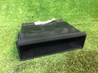 Storage pocket under the radio 66128AE000 SUBARU LEGACY B4