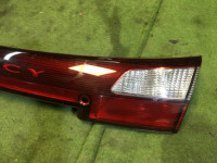 แผงตกแต่งระหว่างไฟท้าย SUBARU LEGACY OEM 84251AE000 BH5 1998