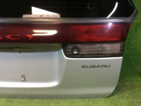 แผงตกแต่งระหว่างไฟท้าย SUBARU LEGACY OEM 84251AC090 BG5 1997
