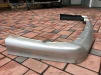 Губа Задняя SUBARU LEGACY OEM E5618AE000SJ BHE BH9 BH5 2000 silver 792