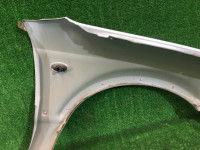 Guarda-lamas dianteiro esquerdo SUBARU LANCASTER OEM 57120AE031 BH9 BHE 2001 grey 1U2