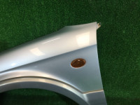 Guarda-lamas dianteiro esquerdo SUBARU LANCASTER OEM 57120AE031 BH9 BHE 2001 grey 1U2