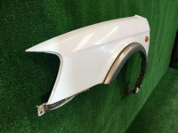 Guarda-lamas dianteiro esquerdo SUBARU LANCASTER OEM 57120AE031, 91111AE010MF BHE BH9 1999 white / grey 8K2
