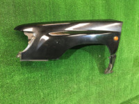 Guarda-lamas dianteiro esquerdo SUBARU FORESTER OEM 57120FC010 SF5 SF9 2000 black 47A