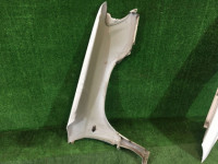 Guarda-lamas dianteiro esquerdo SUBARU FORESTER OEM 57120FC010 SF5 SF9 SF 2000 white 51E