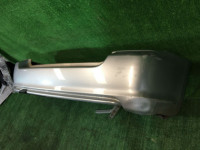 Parachoques trasero SUBARU FORESTER OEM 57703SA010TG SG5 2004 silver 01G