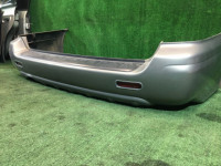 Rear bumper SUBARU LANCASTER OEM 57703AE080LG BHE BH9 2000 silver 9G9