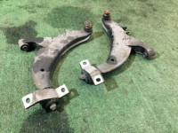 Front control arms SUBARU LANCASTER OEM 20201AC100, 20201AC110, 20200AA200, 20200AA210 BHE BH9 1999 EJ254 AT