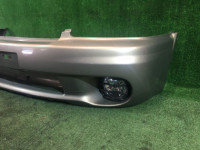 Para-choques dianteiro SUBARU LANCASTER OEM 57703AE130MF, 57711AE060, 84501AE040, 84501AE050 BH9 BHE 1998 beige 8L5
