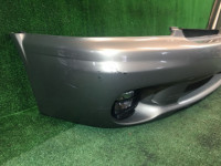 Para-choques dianteiro SUBARU LANCASTER OEM 57703AE130MF, 57711AE060, 84501AE040, 84501AE050 BH9 BHE 1998 beige 8L5