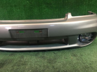 Para-choques dianteiro SUBARU LANCASTER OEM 57703AE130MF, 57711AE060, 84501AE040, 84501AE050 BH9 BHE 1998 beige 8L5