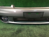 Para-choques dianteiro SUBARU LANCASTER OEM 57703AE130MF, 57711AE060, 84501AE040, 84501AE050 BH9 BHE 1998 beige 8L5