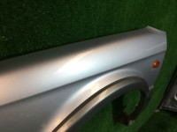 Guarda-lamas dianteiro esquerdo SUBARU LANCASTER OEM 57120AE031 BHE BH9 2002 Silver 1U2