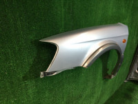 Guarda-lamas dianteiro esquerdo SUBARU LANCASTER OEM 57120AE031 BHE BH9 2002 Silver 1U2