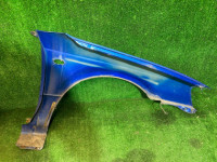 Guarda-lamas dianteiro esquerdo цвет 02C SUBARU LEGACY OEM 57120AE011 BH5 2003 BLUE 02C
