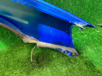 Guarda-lamas dianteiro esquerdo цвет 02C SUBARU LEGACY OEM 57120AE011 BH5 2003 BLUE 02C
