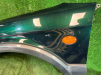 Guarda-lamas dianteiro esquerdo цвет 1U6 SUBARU LANCASTER OEM 57120AE031 BH9 2003 GREEN / GREY 1U6