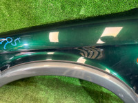 Guarda-lamas dianteiro esquerdo цвет 1U6 SUBARU LANCASTER OEM 57120AE031 BH9 2003 GREEN / GREY 1U6