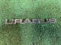 Emblem SUBARU SUBARU LANCASTER OEM 93073AE570 BH9 2001 WHITE PEARL 07C / 081