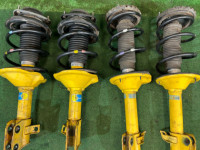 Amortecedores SUBARU LEGACY OEM 20310AC320 20310AC330 20330AC070 20364AC300 20364AC310 BG5 1998 EJ20D MT5