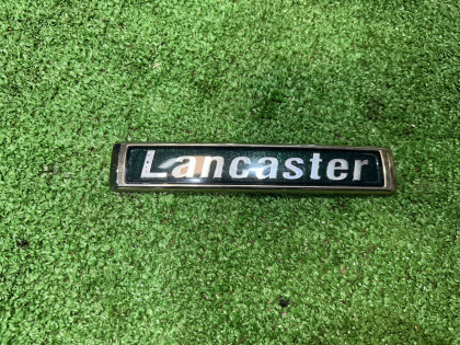 โลโก้ LANCASTER 93073AE410 SUBARU LANCASTER