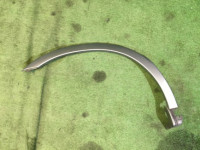Ensanchador de aleta trasero derecho 91111AE020MF SUBARU LANCASTER