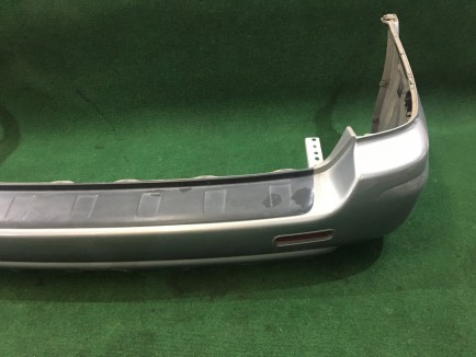 Para-choques traseiro SUBARU LANCASTER OEM 57703AE080LG XX57703AE080 BHE 2000 white / grey 0U4