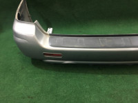 Para-choques traseiro SUBARU LANCASTER OEM 57703AE080LG XX57703AE080 BHE 2000 white / grey 0U4