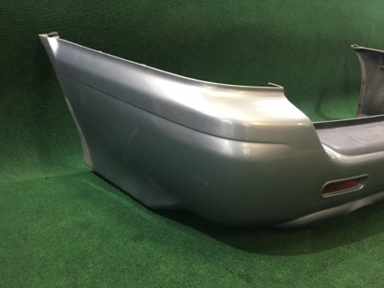 Para-choques traseiro SUBARU LANCASTER OEM 57703AE080LG XX57703AE080 BHE 2000 white / grey 0U4