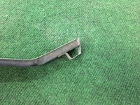 Soporte izquierdo del parachoques delantero SUBARU LANCASTER OEM 57707AE240 BHE 2000 white / grey 0U4