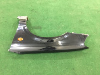 Guarda-lamas dianteiro esquerdo SUBARU LEGACY B4 OEM 57120AE011 BE5 2001 Black 47A