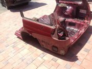 Guarda-lamas traseiro esquerdo SUBARU LEGACY OEM 51410AC891, 51410AC471, 51510AC311, 51510AC301, 51510AC300, BG5 1997 red 53D