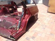Guarda-lamas traseiro esquerdo SUBARU LEGACY OEM 51410AC891, 51410AC471, 51510AC311, 51510AC301, 51510AC300, BG5 1997 red 53D