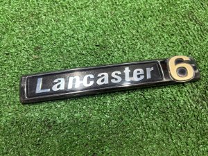 โลโก้ LANCASTER 93073AE650 SUBARU LEGACY LANCASTER