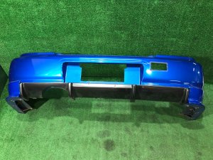 Para-choques traseiro с клыками 57703FE050PG SUBARU IMPREZA