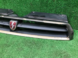 Radiator grille SUBARU LEGACY OEM 91061AC201 BG5 1997 RED