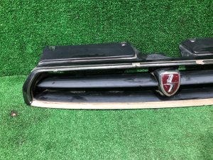 Radiator grille SUBARU LEGACY OEM 91061AC201 BG5 1997 RED