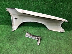 Guarda-lamas dianteiro esquerdo SUBARU FORESTER OEM 57120FC010 SF9, SF5 1998 White 51E