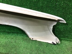 Guarda-lamas dianteiro esquerdo SUBARU FORESTER OEM 57120FC010 SF9, SF5 1998 White 51E