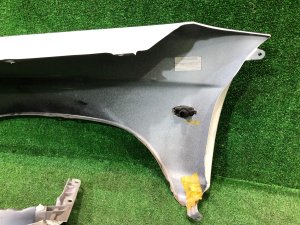 Guarda-lamas dianteiro direito SUBARU FORESTER OEM 57120FC000 SF9, SF5 1998 White 51E