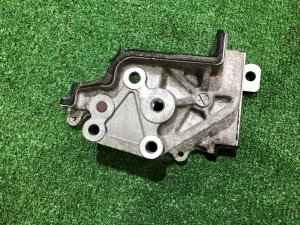 Timing belt tensioner bracket 13156AA110 SUBARU EXIGA